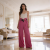 freepik__young-woman-presents-trousers-in-a-luxurious-apart__97643.png